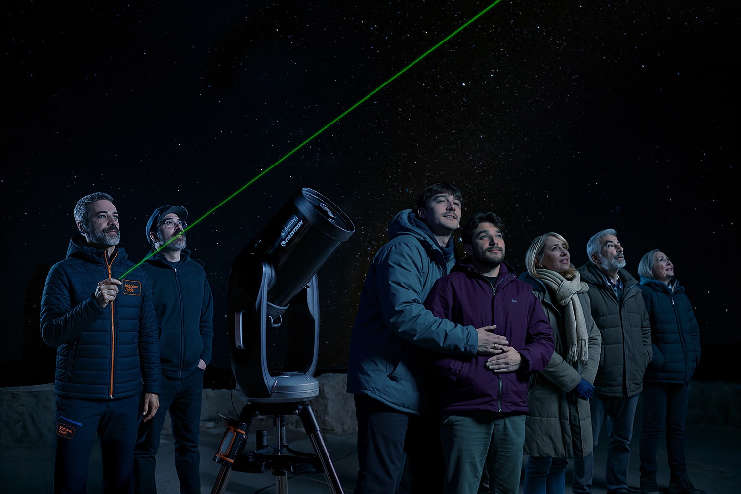 Starlight guide giving explanations and indications during the astronomical observation in groups at Teide Starlight guide giving explanations and indications during the astronomical observation in groups at Teide