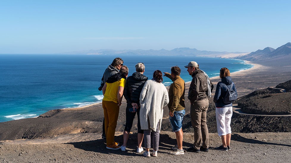 Tourists on an excursion to Cofete in Fuerteventura by Jeep Safari Tourists on an excursion to Cofete in Fuerteventura by Jeep Safari